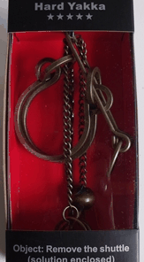 Enigma Metal Puzzles - Blacksmith's Bell , on a Metal Stand